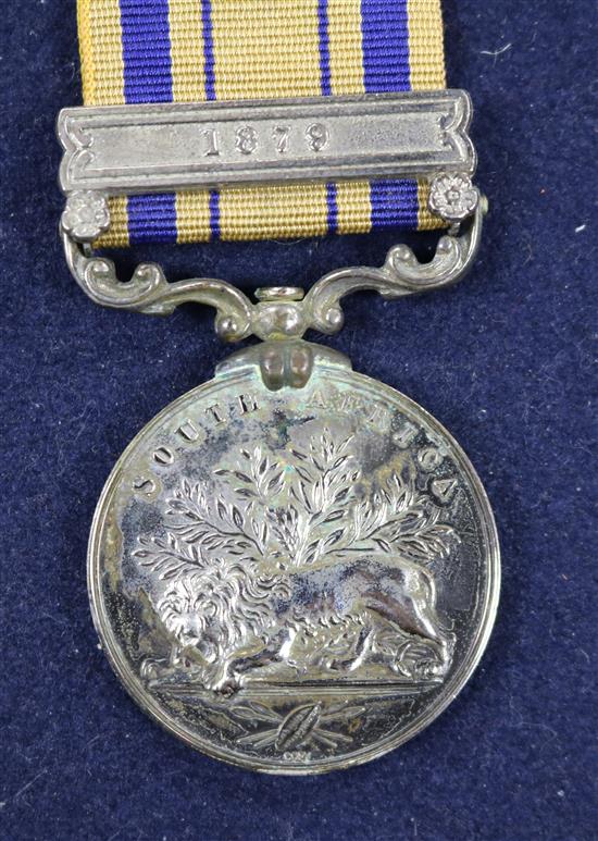 A Victorian South Africa medal with 1879 clasp, A QEII Africa medal with Kenya clasp named T Whitelow,